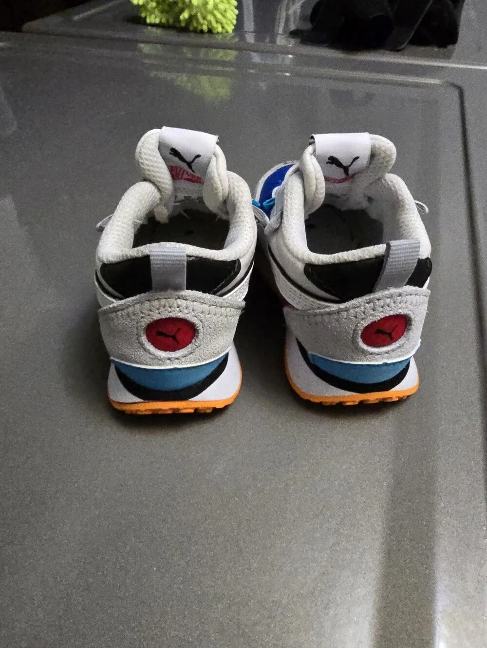 Puma Kids Royal Blue, White & Light Blue Sneakers with Orange Accent